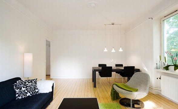 Green Environment and Wooden Floor Apartment Design - Livingroom