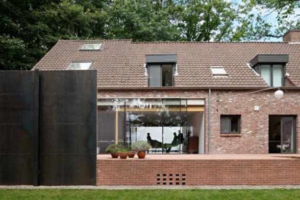 Mixed Country Home Plans and Modern Design with Futuristic Steel Wall - Garden