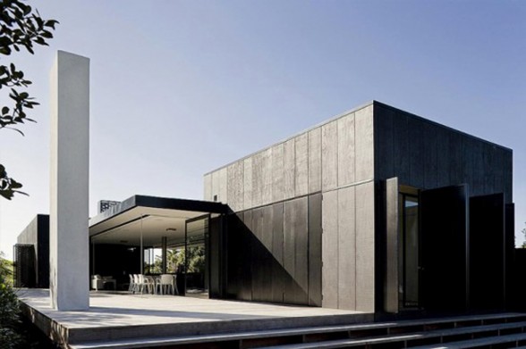 Black Cubic House Design with Mixing Modern Architecture and Natural Environment