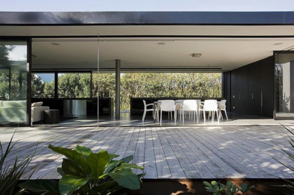Black Cubic House Design with Mixing Modern Architecture and Natural Environment - Terraces