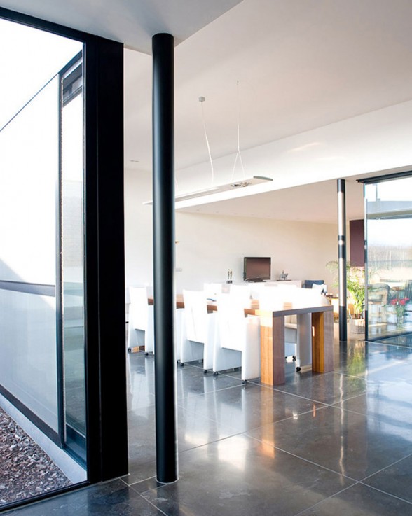 Modern Brick House Design with Irregular Shape Architecture - Dining Room