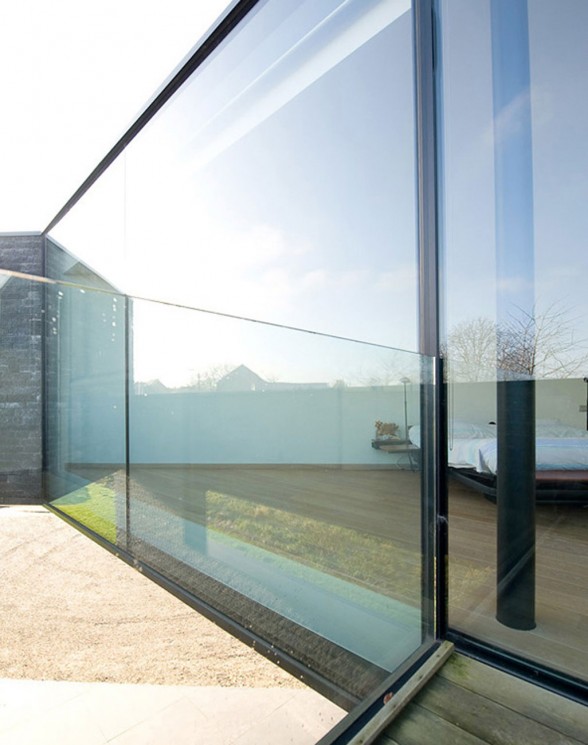 Modern Brick House Design with Irregular Shape Architecture - Glass Door