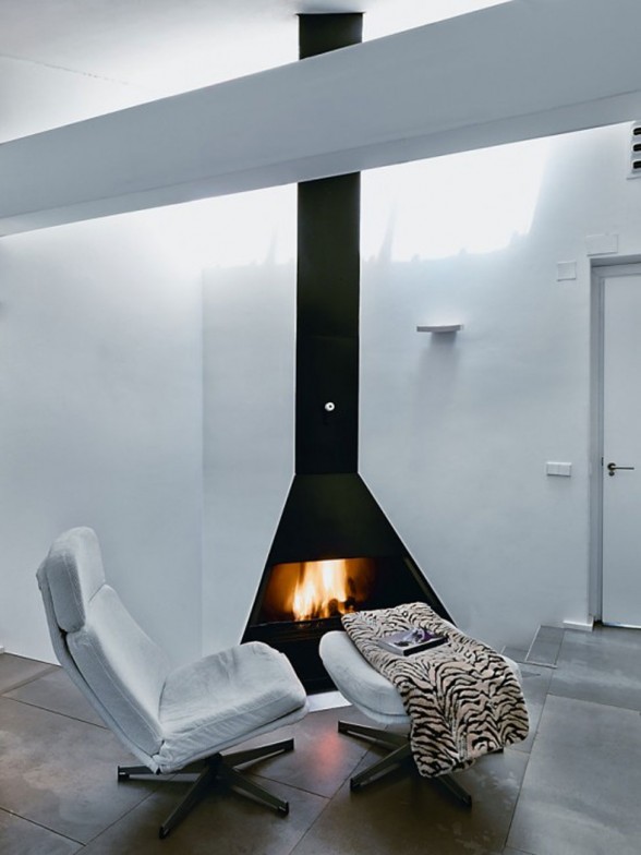 Old House to be Two Storey Apartment Design in Madrid - Fireplace