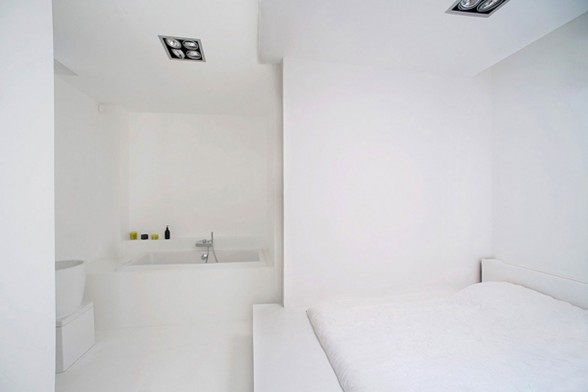 Chic Apartment Design with Bright Theme In Paris - Bathtub in Bedroom