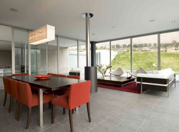 Large Concrete House Design with Glass Façade and Breathtaking Views in Andes - Dining Table