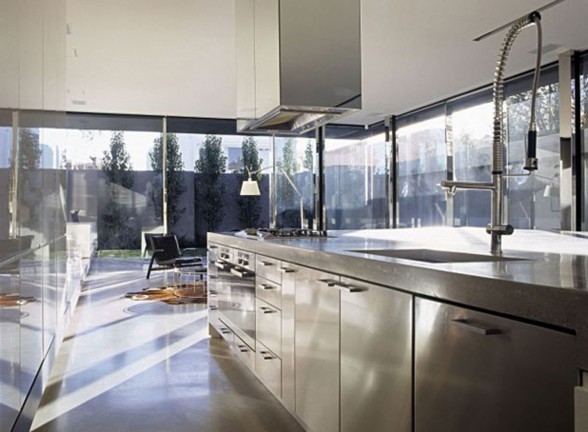 Modern Interior Design for a Contemporary Concrete House in Australia - Stainless Steel Kitchen