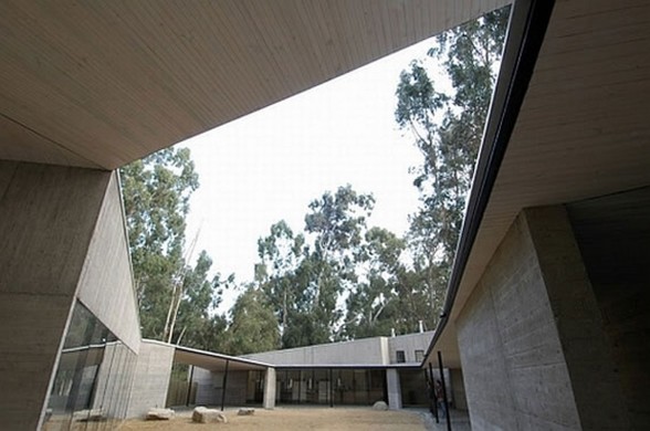 Rural House Design in Concrete Style Architecture from Martin Hurtado Architect - Center Yard