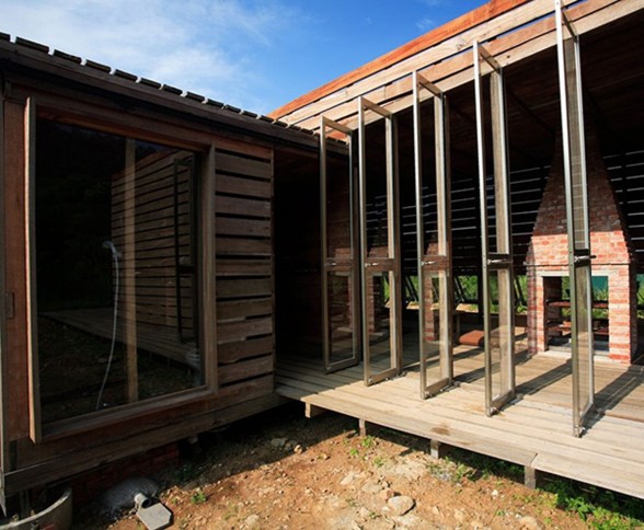 Timber House with Mahogany Materials from Marco Casagrande - Doors
