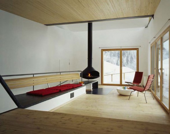 Wooden Mountain House in Swiss Alps from Drexler Guinand Jauslin - Fireplace