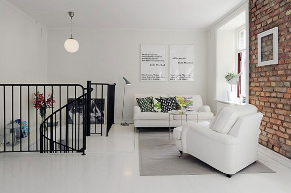 Elegant White Interior Design of a Minimalist Duplex Apartment Plans - Livingroom