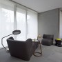 Contemporary Concrete Building Architectural Designs with Revolutionary Furnishing Space: Simple Seating Space Ideas