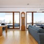 Modern Breezy Penthouse Adorned With Quiet Natural Colors: Clock Details Modern Breezy Penthouse