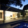 Beautiful Pool House In Melbourne With Cozy Natural Shading: Night View Swimming Pool Area