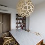 AO Studios has designed the Natura Loft Apartment: Natura Loft Apartment Dining Area