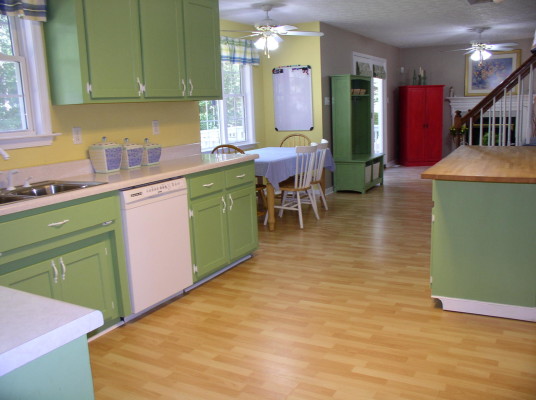 Fascinating Green Kitchen Cupboards Ideas Yellow Backsplash Laminate Floor