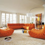 Togo Sofa as Your Choice to Have a Comfort Life: Wonderful Orange Togo Sofa White Artistic Lamps Spacious Living Room