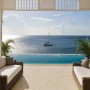 Beach House Design in Pitons of St. Lucia By Lane Pattigrew: Beach House Classic French Colonial Style Exterior With Rattan Comfy Sofa And Stone Flooring Also Pool Side Terrace And Sea View