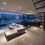 Wonderful Modern Property Style by Kidosaki Architects: Living Room Design Property By Kidosaki Architects
