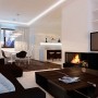 Modern Apartment Designs in Different Styles and Senses: Apartment Interior With Modern Black Sofa And Wooden Coffee Table
