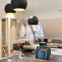 Modern Attic Apartment For Sale In Sweden: Stylish Black Pendant Lamps With Circular Shade Matched With Black Dining Carved Chairs And Simple Table