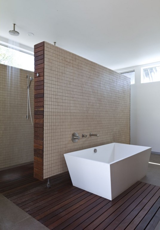 Simple White Bathtub in Prism Shape Design Combine with Wood and Tiles Divided from Shower Space