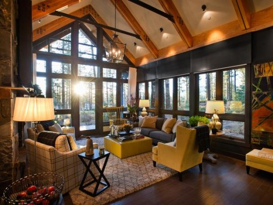 2014 Living Room Trends With Plenty Of Windows On The Wall Presenting Wooded Area View Outside