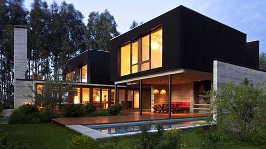 Modern House Architecture with Beautiful Yellow Interior and Exterior Lighting